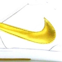 BOTAS DE SPORT BLANCO Y ORO