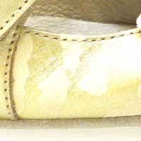 Zapato cuna piel metalizada oro